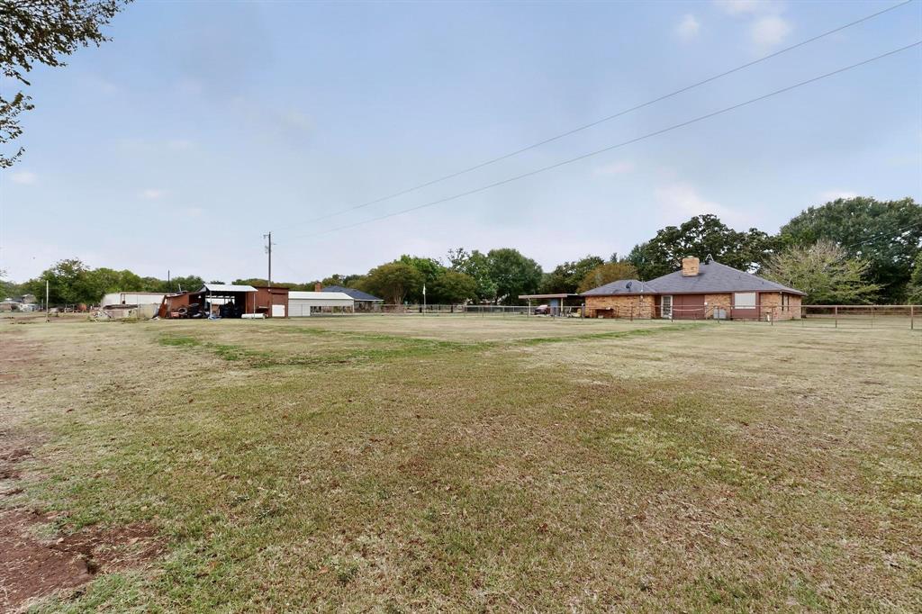 865 Harlan Road Combine, TX 75159 - Photo 38 of 38 a view of a field of grass and trees