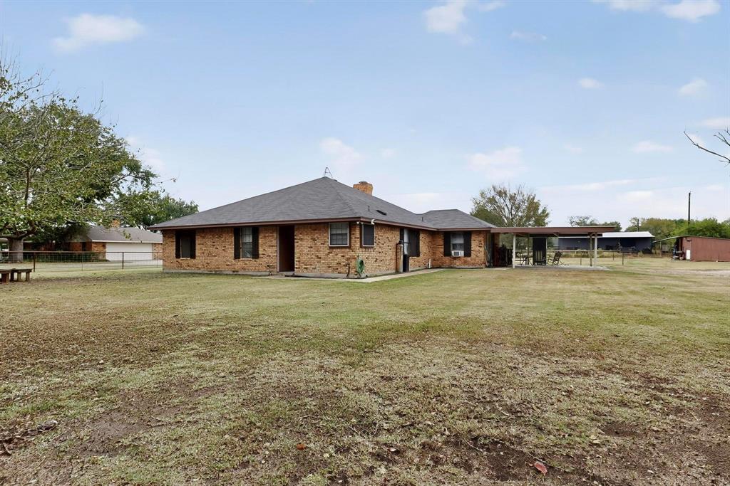865 Harlan Road Combine, TX 75159 - Photo 4 of 38 a front view of a house with a yard