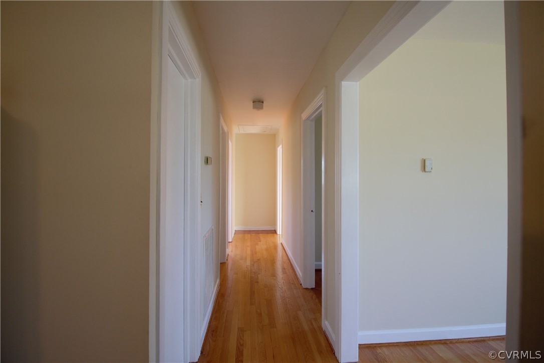 9893 Francisco Road Farmville, VA 23901 - Photo 12 of 26 a view of a hallway with wooden floor