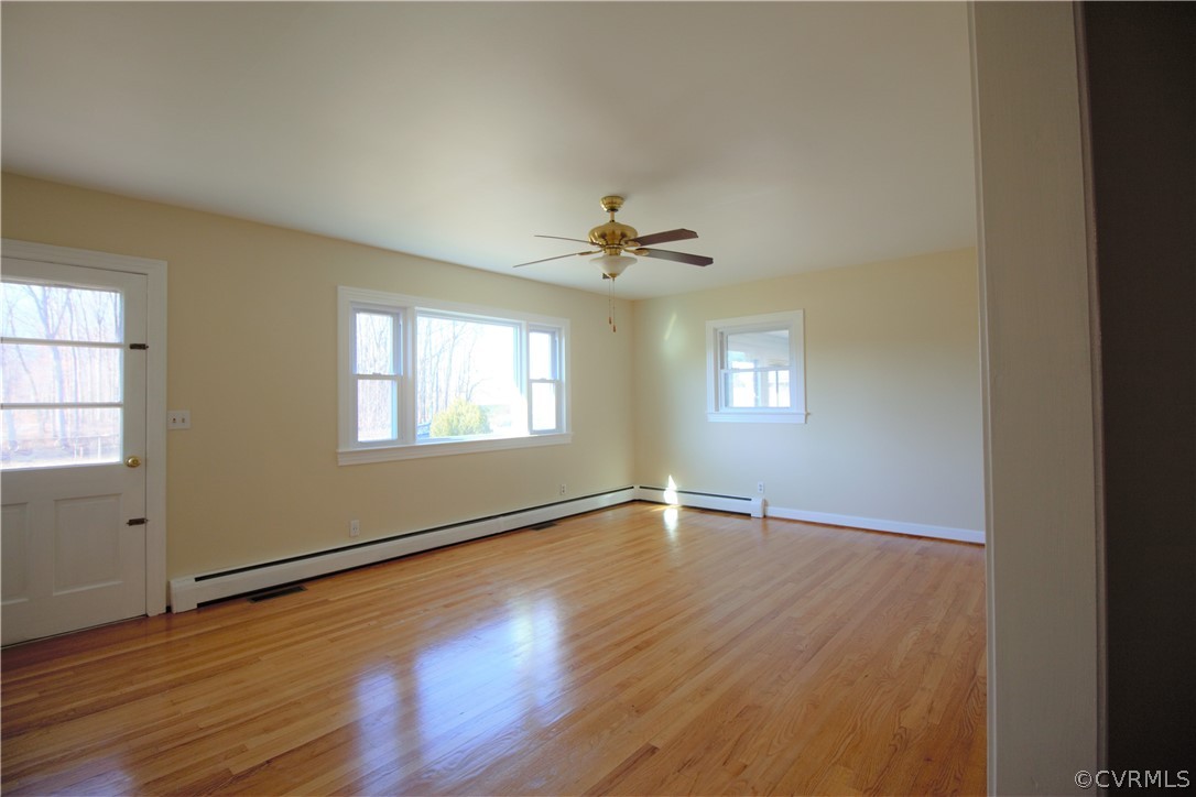 9893 Francisco Road Farmville, VA 23901 - Photo 15 of 26 wooden floor in an empty room with a window