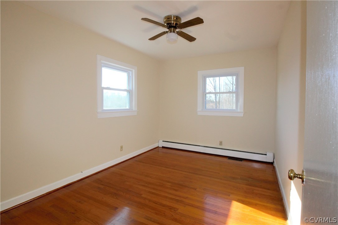 9893 Francisco Road Farmville, VA 23901 - Photo 17 of 26 an empty room with windows and fan
