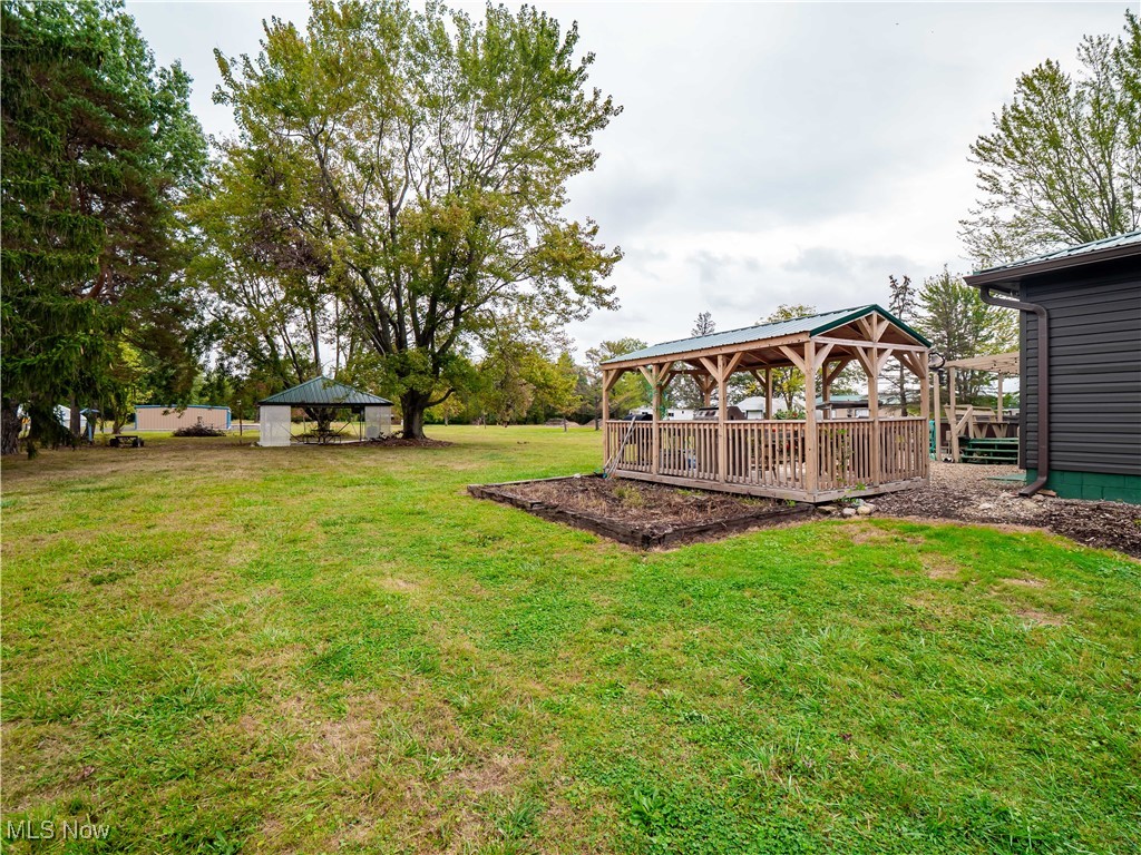 9049 Oberlin Road Elyria, OH 44035 - Photo 28 of 42 View of grassy yard with a gazebo