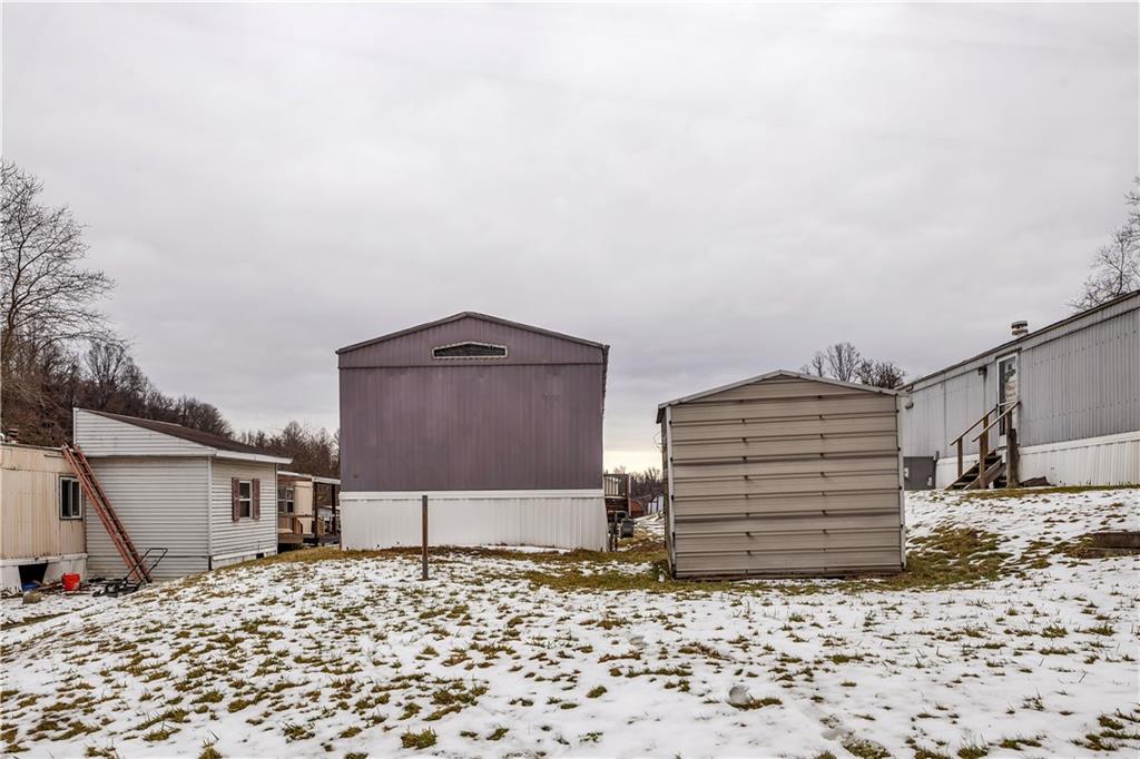 111 Dancer Lane Jeannette, PA 15644 - Photo 5 of 26 a backyard of a house