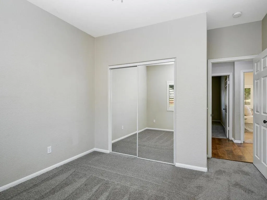 16304 Dartolo Road Ramona, CA 92065 - Photo 23 of 36 an empty room with closet