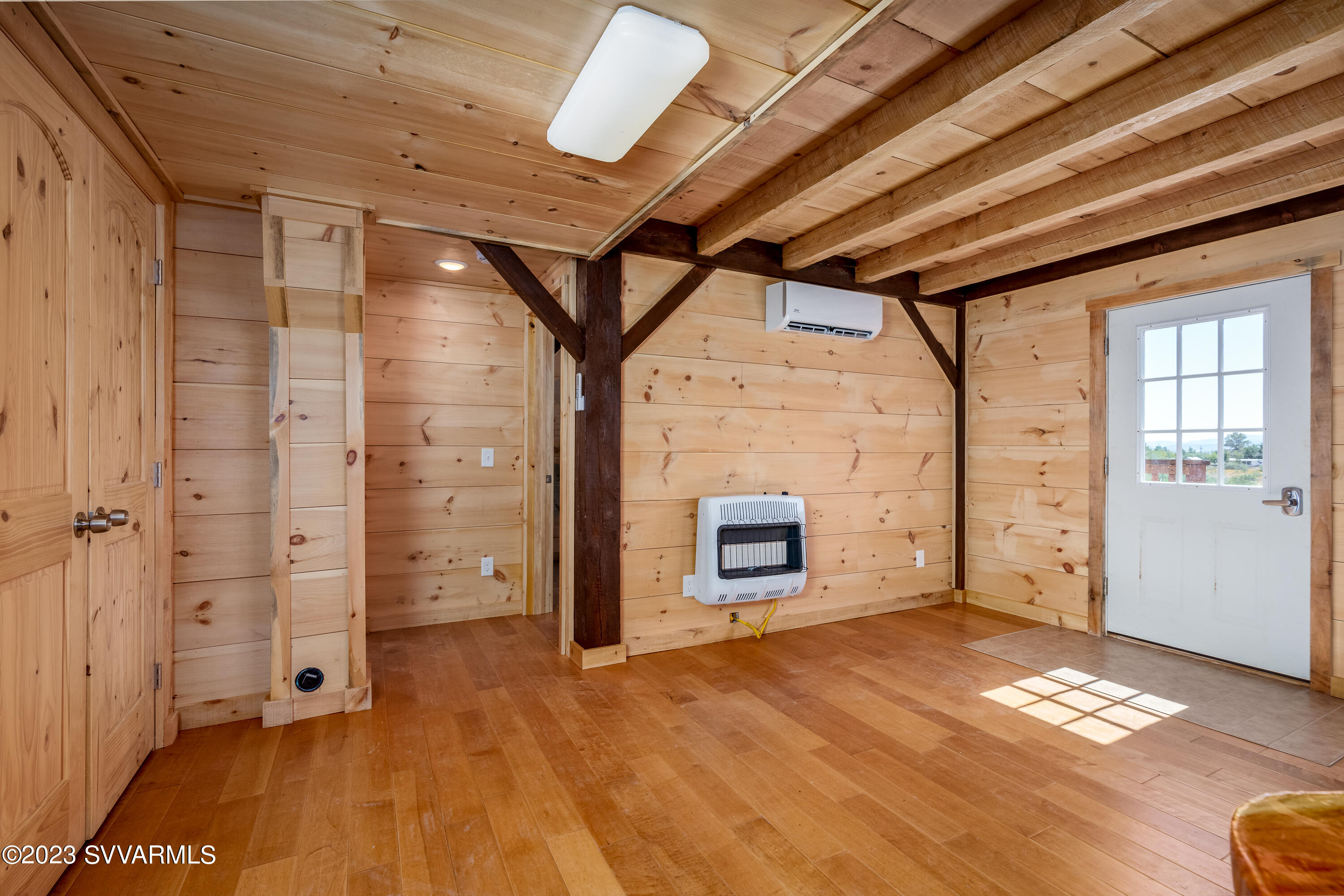 1652 Montezuma Heights Road Camp Verde, AZ 86322 - Photo 12 of 29 a view of empty room with wooden floor