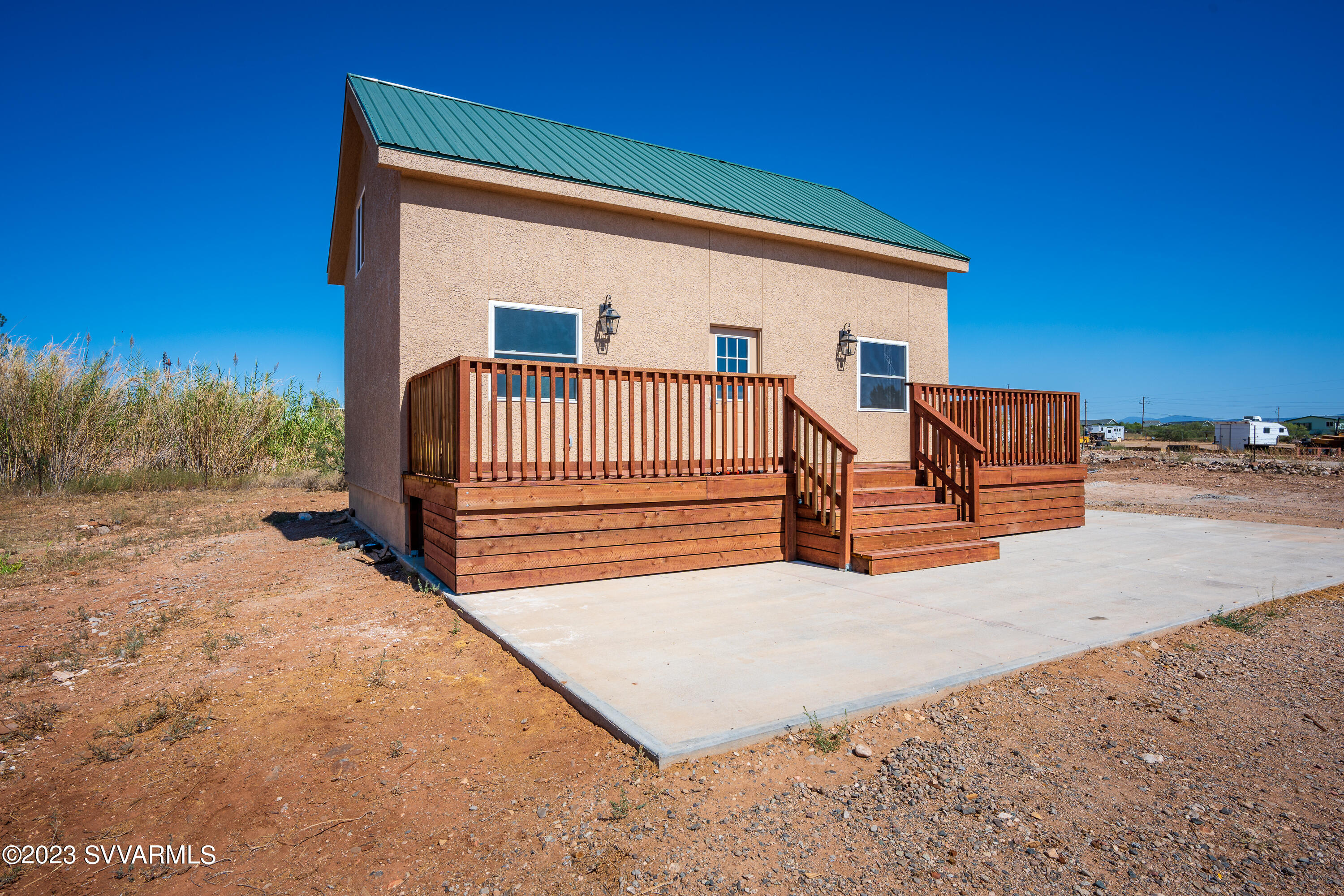 1652 Montezuma Heights Road Camp Verde, AZ 86322 - Photo 4 of 29 a view of backyard with deck and a garden