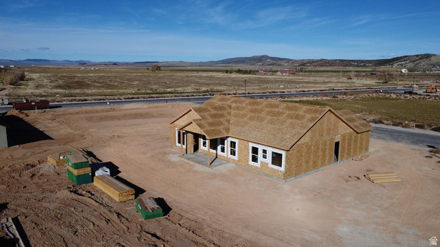 4973 North 900 East Enoch, UT 84721 - Photo 6 of 8 Overview of rural landscape featuring a mountainous background