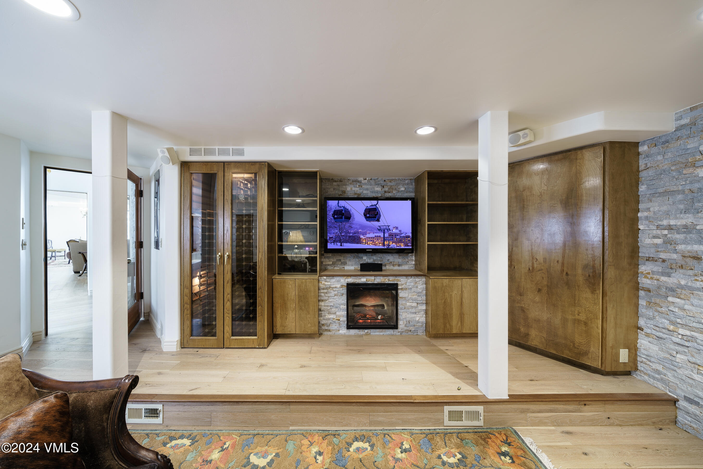 4747 Wildridge Road Avon, CO 81620 - Photo 21 of 51 a living room with furniture and a flat screen tv