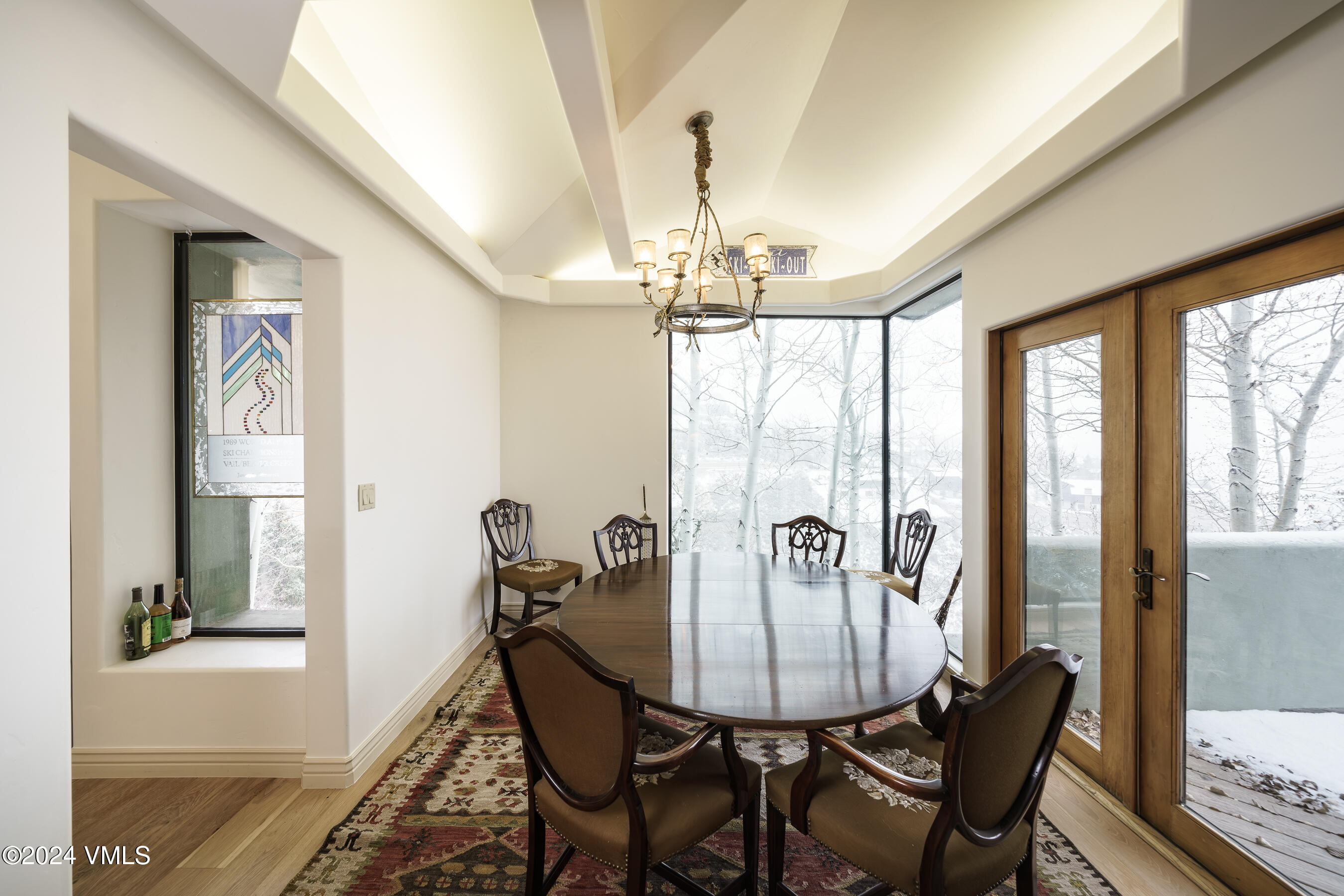 4747 Wildridge Road Avon, CO 81620 - Photo 27 of 51 a view of a dining room with furniture window and outside view