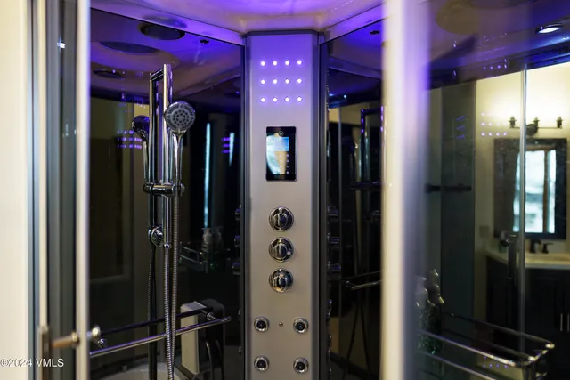 a view of a couches with wooden floor