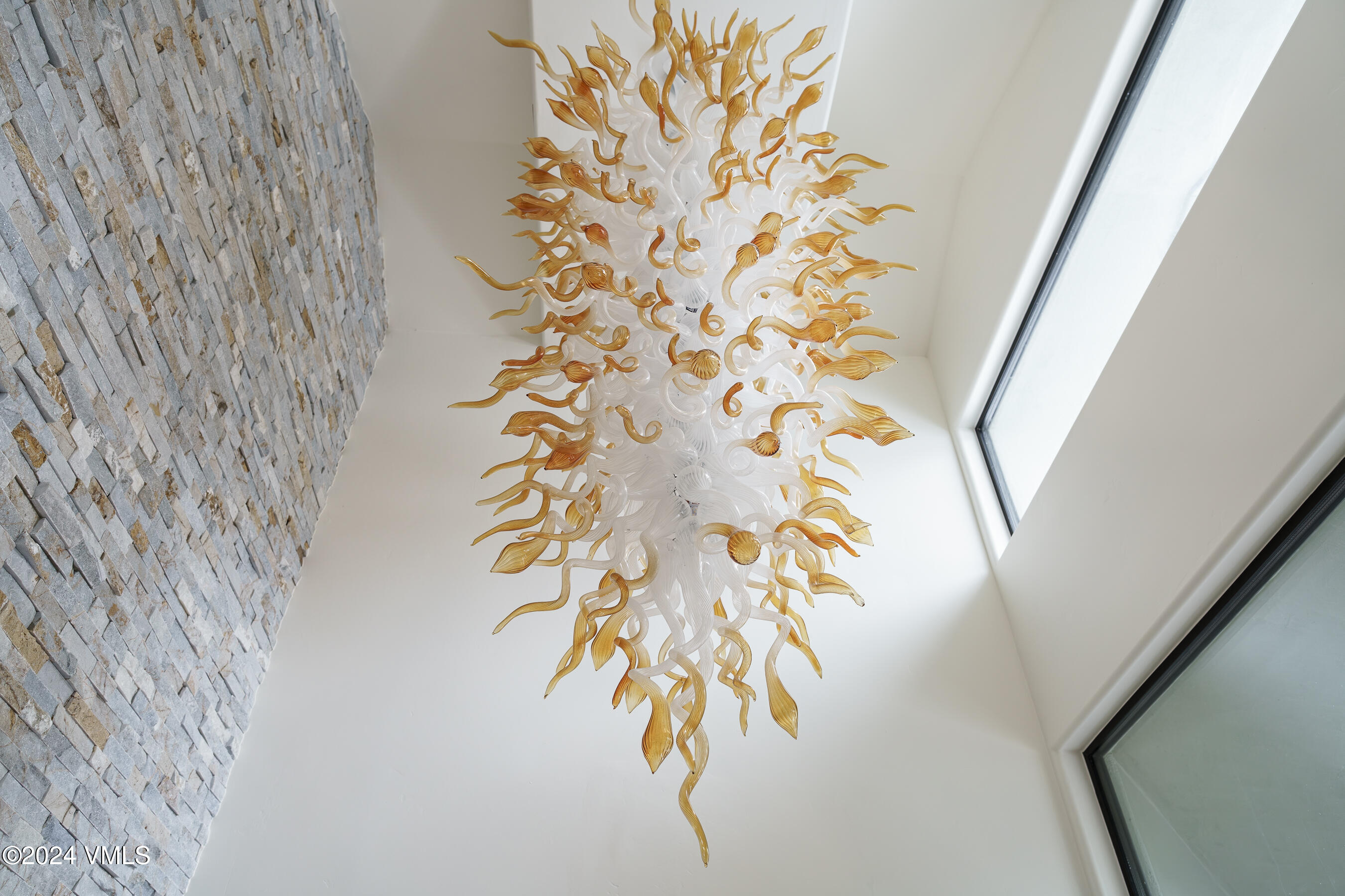 4747 Wildridge Road Avon, CO 81620 - Photo 5 of 51 a bathroom with a shower curtain and a shower curtain