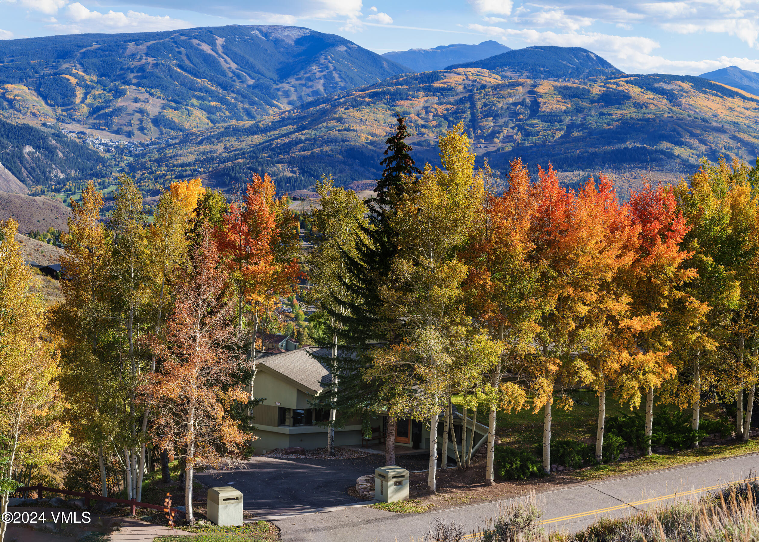 4747 Wildridge Road Avon, CO 81620 - Photo 51 of 51 a backyard of a house with large trees