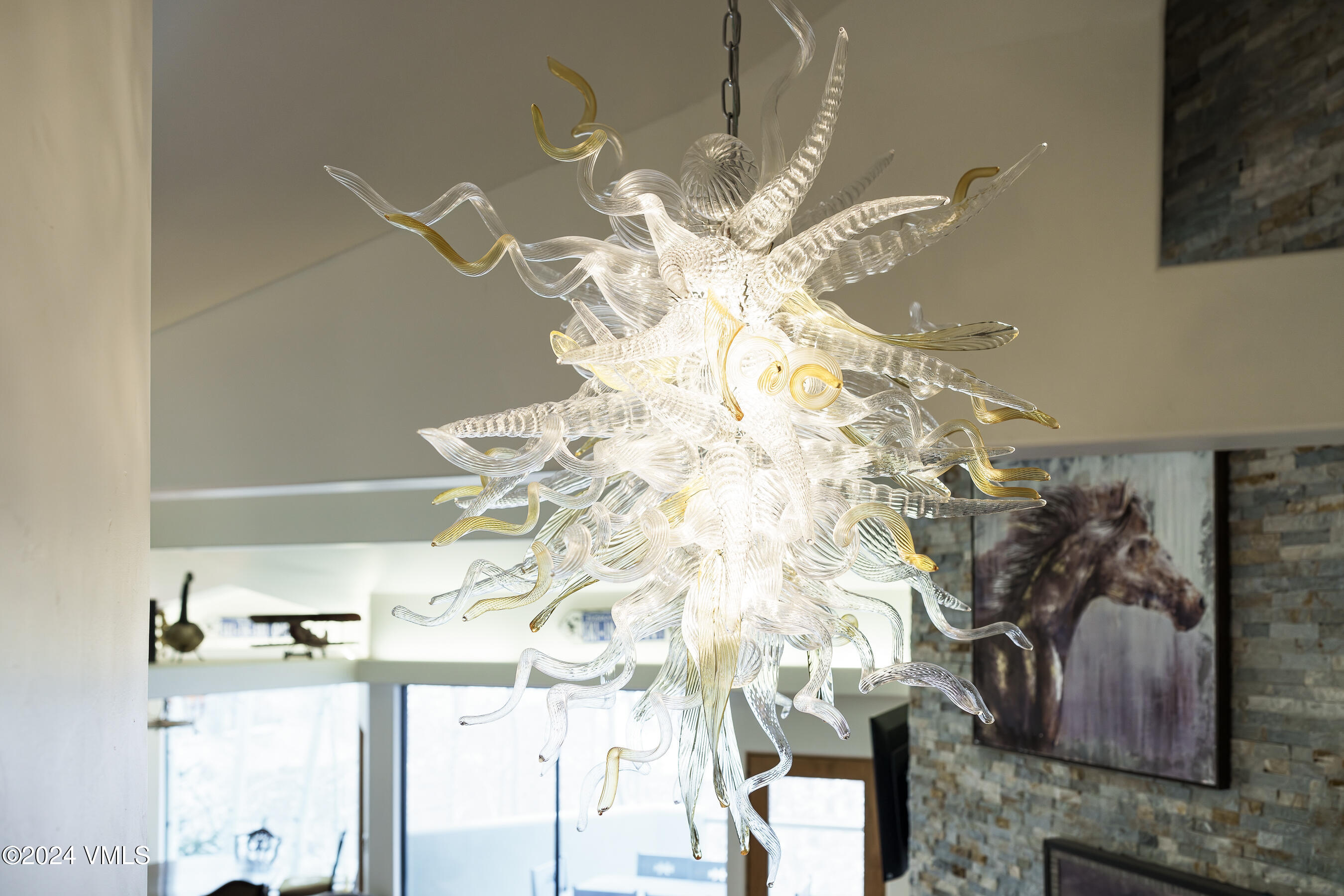 4747 Wildridge Road Avon, CO 81620 - Photo 6 of 51 a view of a chandelier in a room