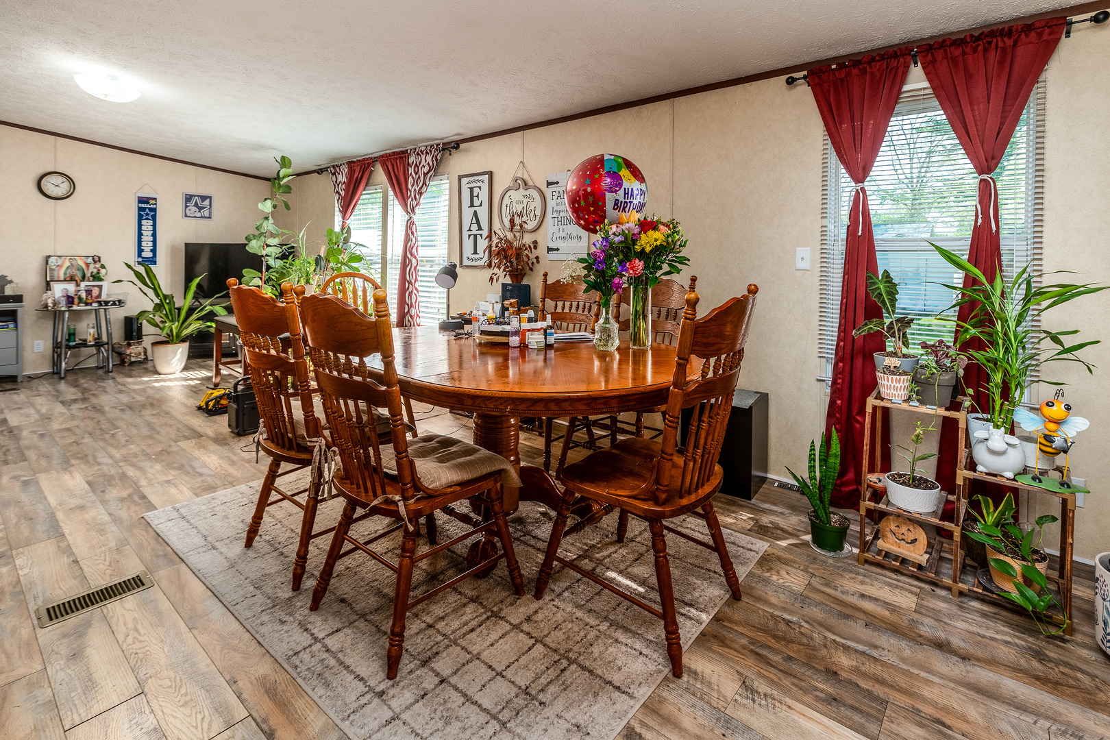 104 South Wells Street Du Quoin, IL 62832 - Photo 11 of 33 a view of a dining room with furniture a chandelier and wooden floor