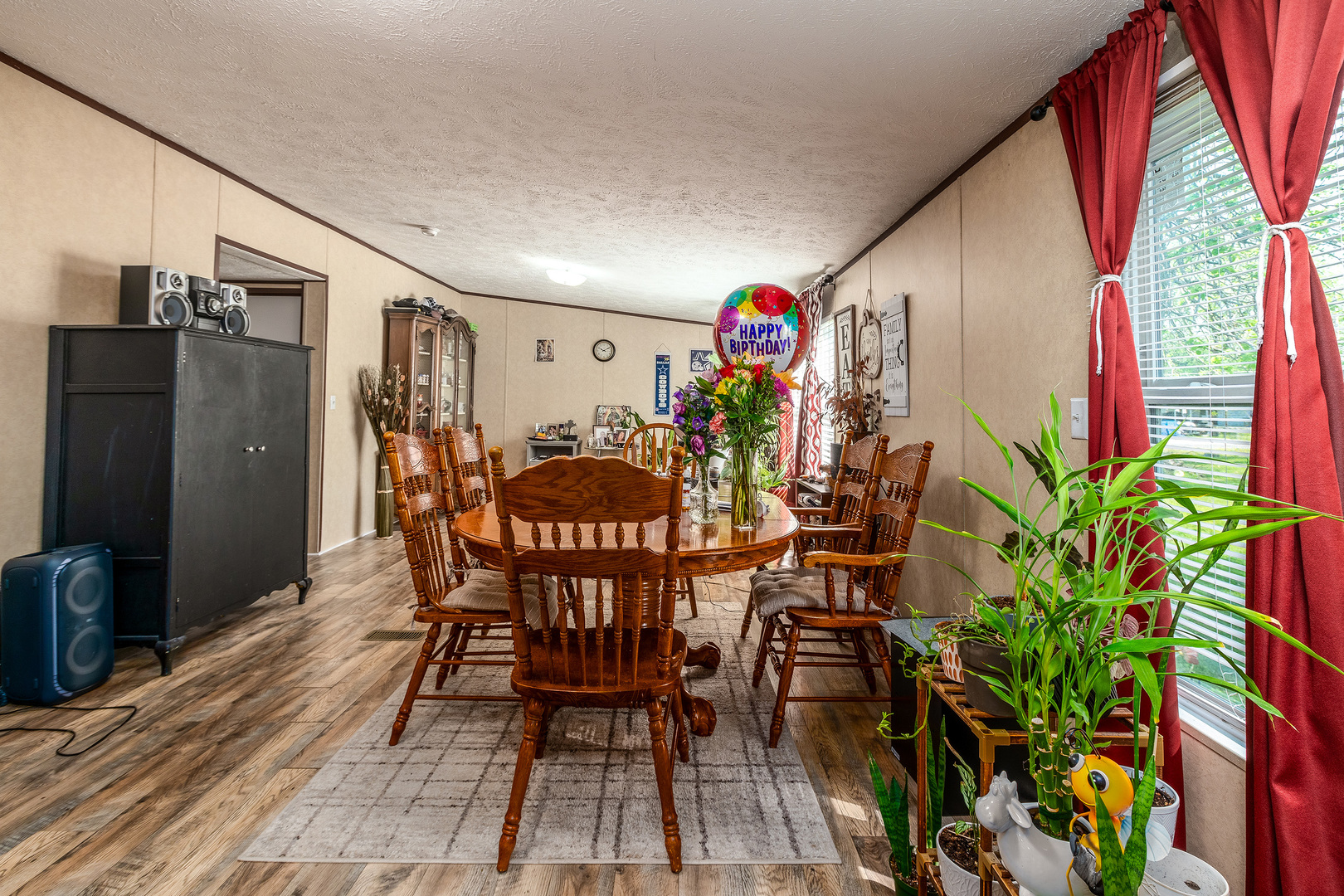 104 South Wells Street Du Quoin, IL 62832 - Photo 12 of 33 a view of a dining room with furniture and wooden floor