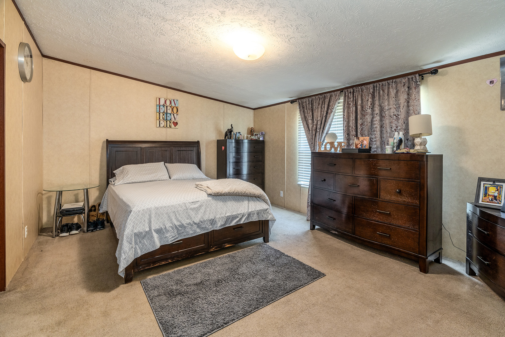104 South Wells Street Du Quoin, IL 62832 - Photo 15 of 33 a bedroom with a bed and a fireplace
