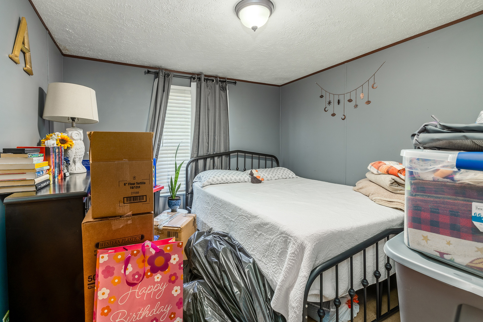 104 South Wells Street Du Quoin, IL 62832 - Photo 20 of 33 a bedroom with a bed closet and window