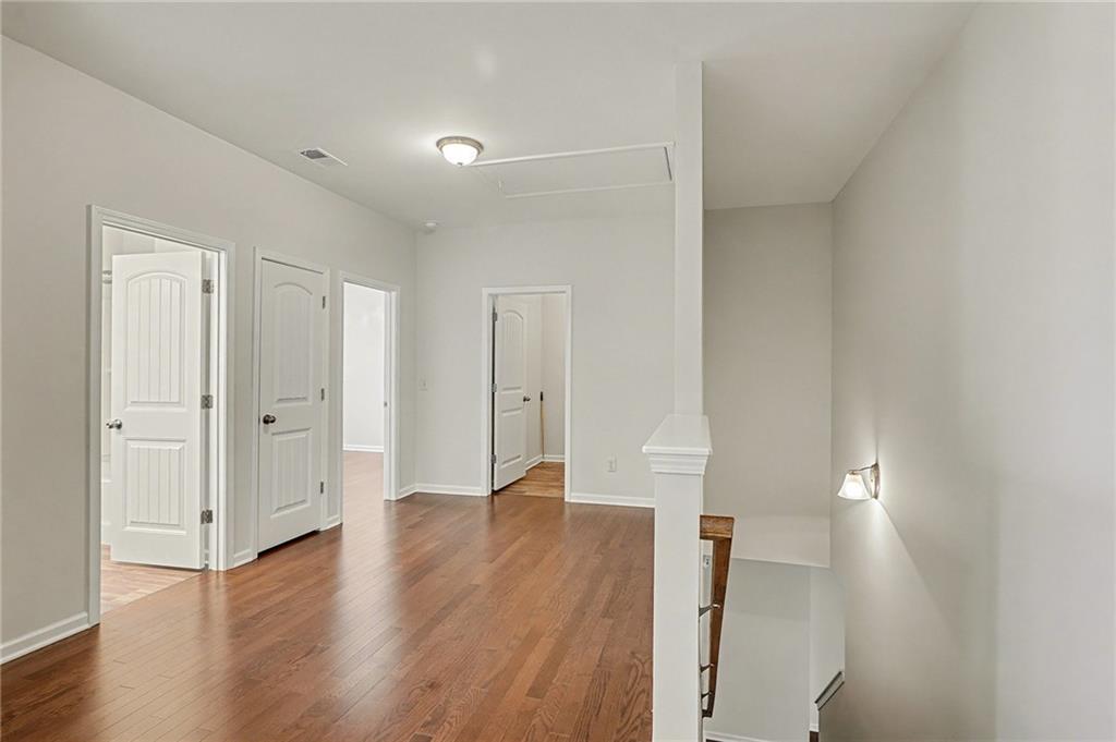 321 Lara Lane Hampton, GA 30228 - Photo 16 of 33 wooden floor in an empty room