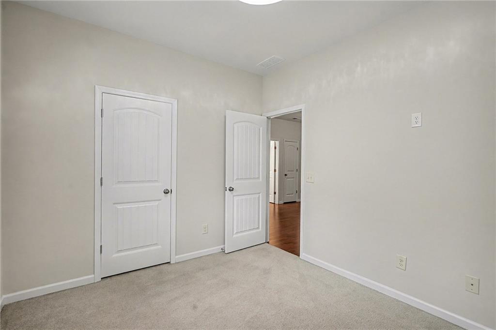321 Lara Lane Hampton, GA 30228 - Photo 20 of 33 a view of an empty room and closet area