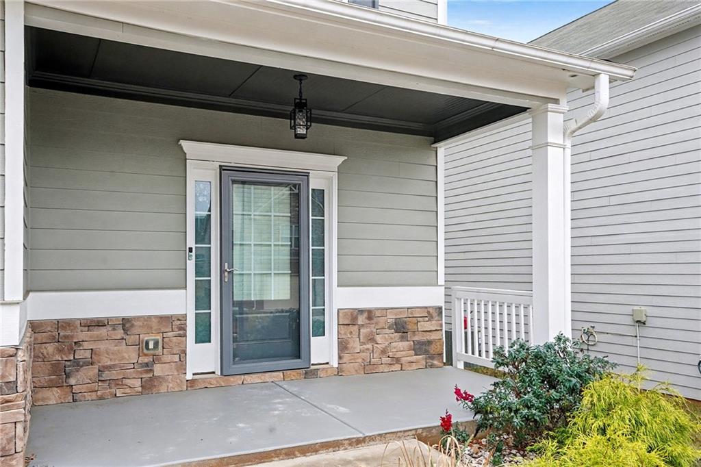 321 Lara Lane Hampton, GA 30228 - Photo 3 of 33 a view of entrance door of the house