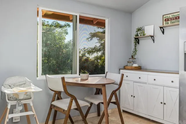 a stove top oven sitting inside of a kitchen