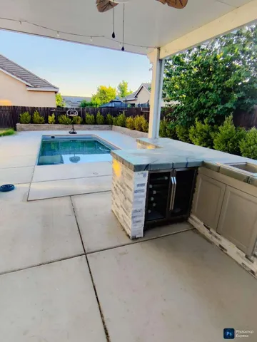 a view of a swimming pool and outdoor space