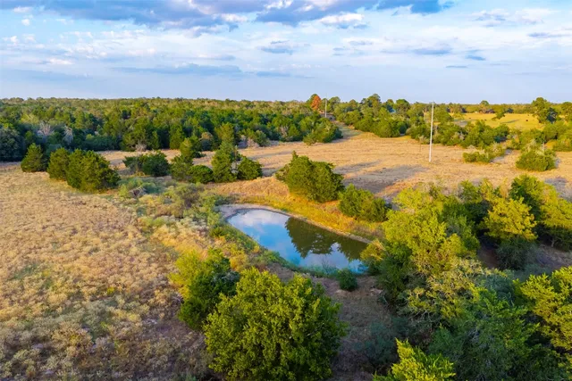 a view of a lake with a house