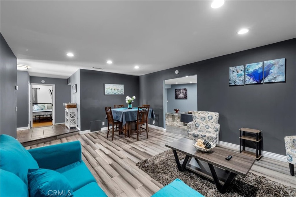 1733 East Dimondale Drive Carson, CA 90746 - Photo 1 of 43 a living room with furniture and wooden floor