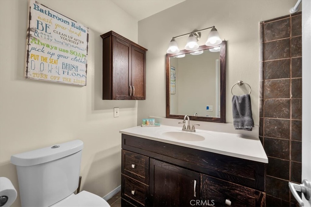 1733 East Dimondale Drive Carson, CA 90746 - Photo 23 of 43 a bathroom with a sink vanity and toilet