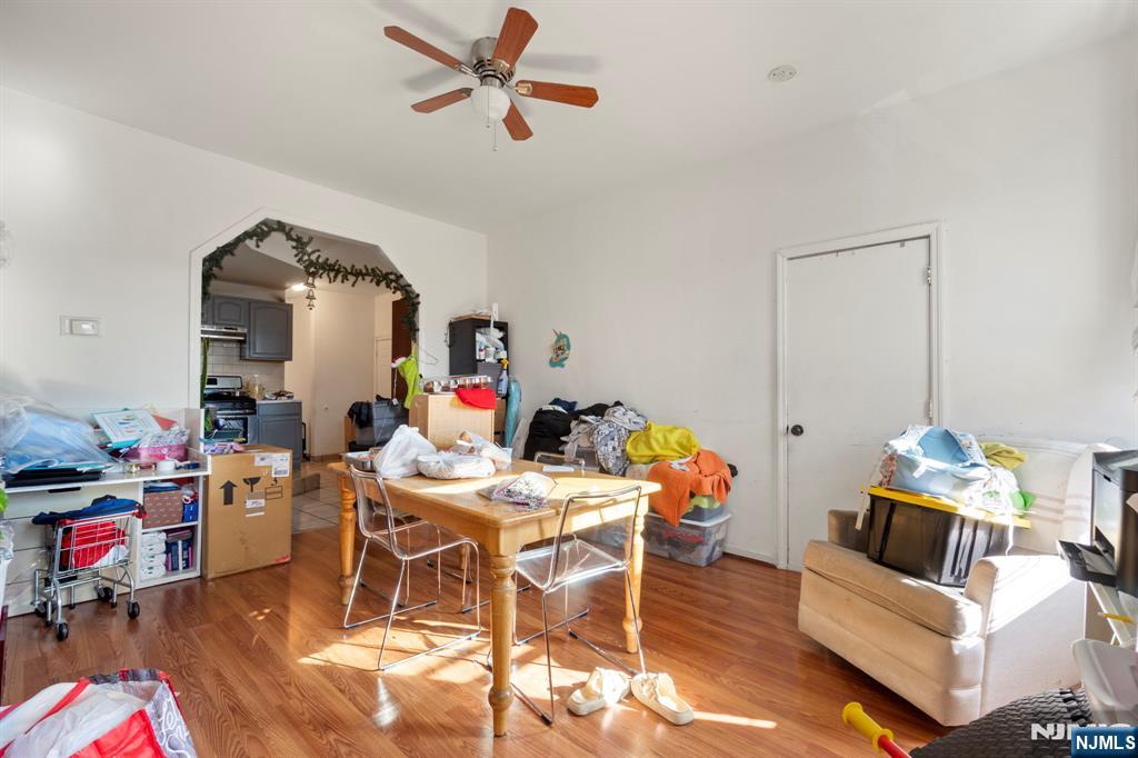 67 Broadway Newark, NJ 07104 - Photo 9 of 18 a view of a dining room with furniture and a rug