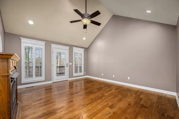 a kitchen with stainless steel appliances granite countertop a sink stove and microwave