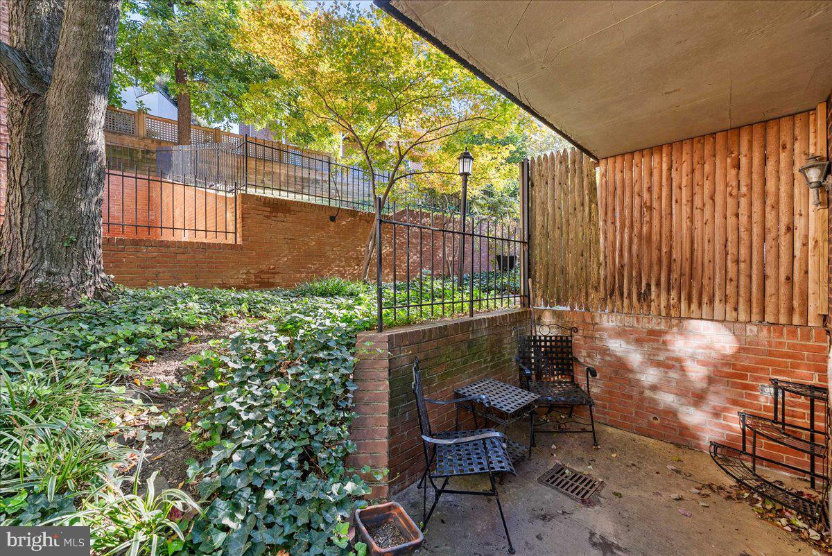 4625 MacArthur Boulevard Northwest, Unit A Washington, DC 20007 - Photo 12 of 14 a bench is sitting in middle of the house