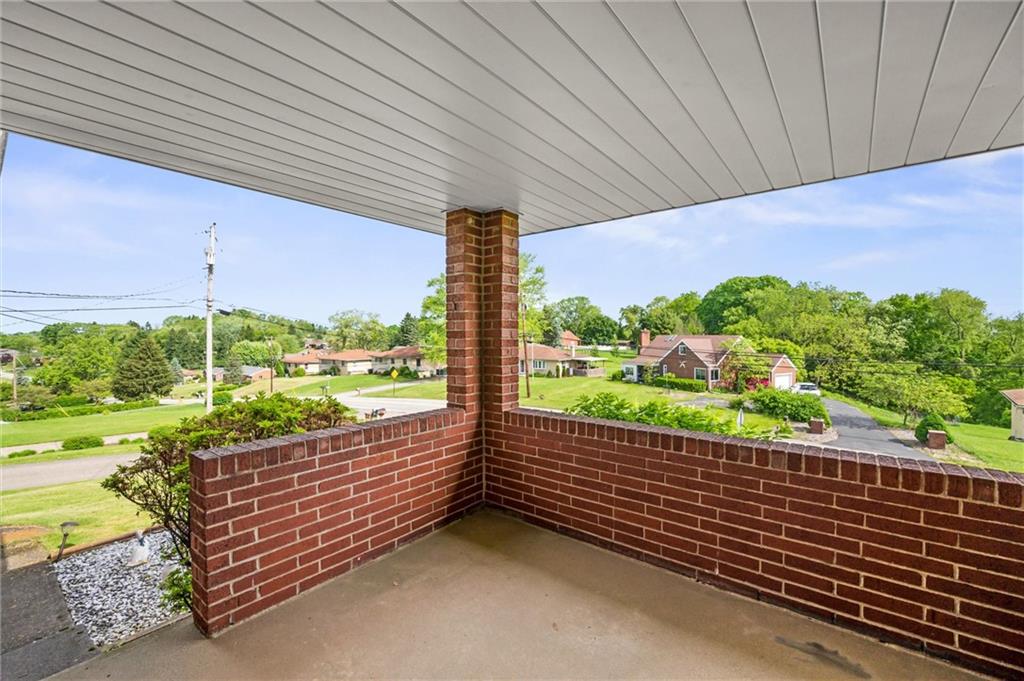 13680 Ridge Road Irwin, PA 15642 - Photo 2 of 40 a view of a sitting area and a garden