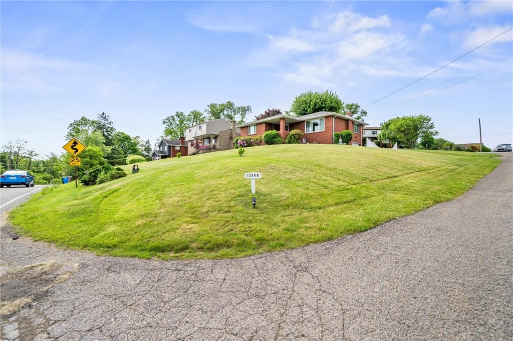 13680 Ridge Road Irwin, PA 15642 - Photo 26 of 40 a swimming pool with outdoor seating and garden