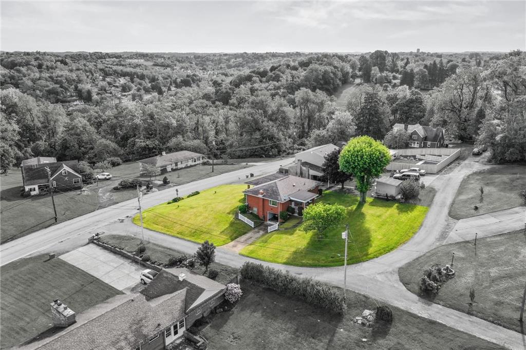13680 Ridge Road Irwin, PA 15642 - Photo 27 of 40 an aerial view of a swimming pool with outdoor seating