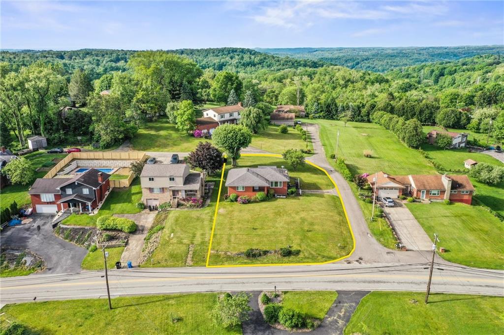 13680 Ridge Road Irwin, PA 15642 - Photo 28 of 40 a view of a swimming pool with a yard