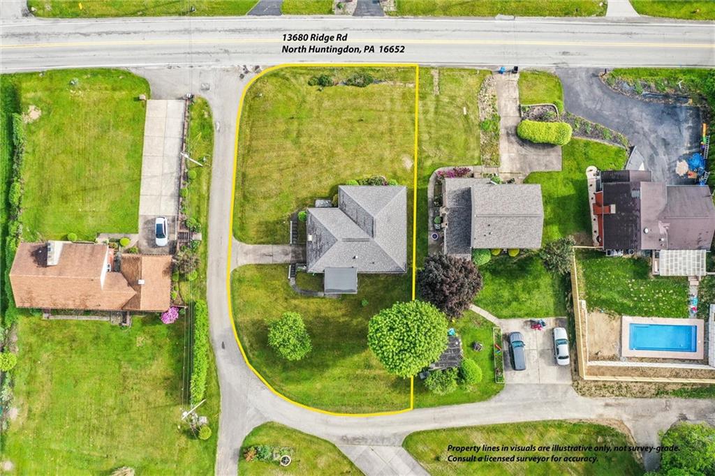 13680 Ridge Road Irwin, PA 15642 - Photo 35 of 40 a aerial view of a house with swimming pool garden and patio