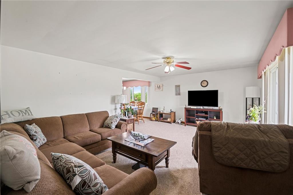 13680 Ridge Road Irwin, PA 15642 - Photo 4 of 40 a living room with furniture and a flat screen tv