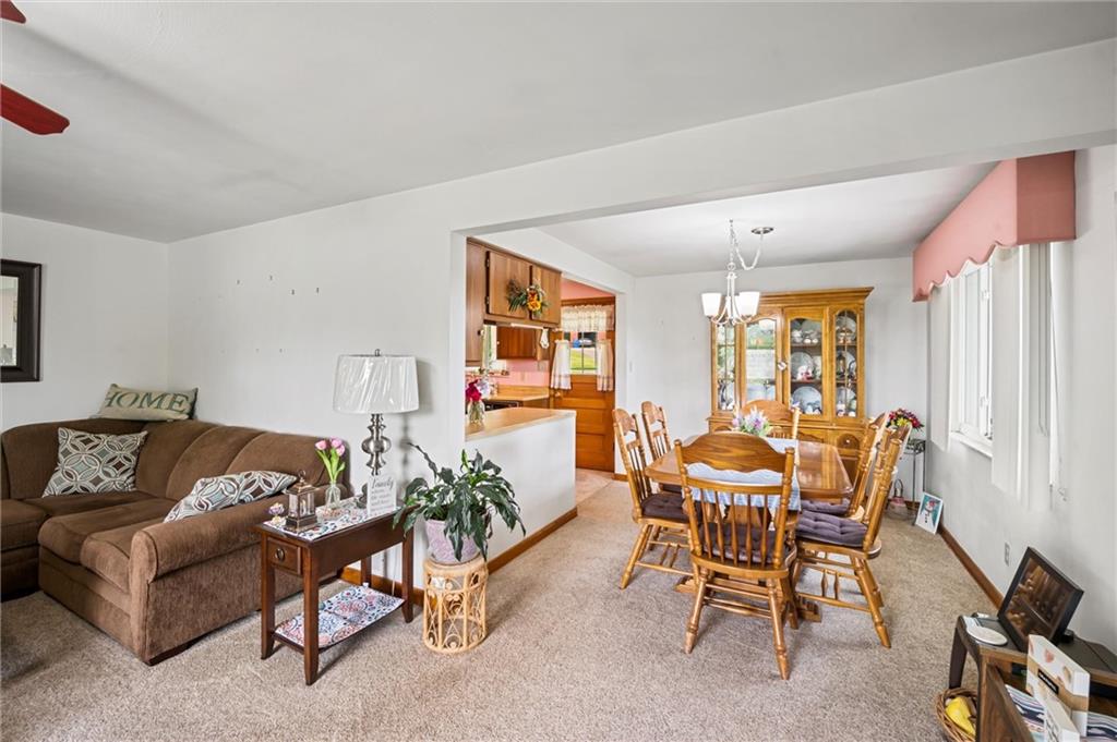 13680 Ridge Road Irwin, PA 15642 - Photo 6 of 40 a living room with furniture and a large window