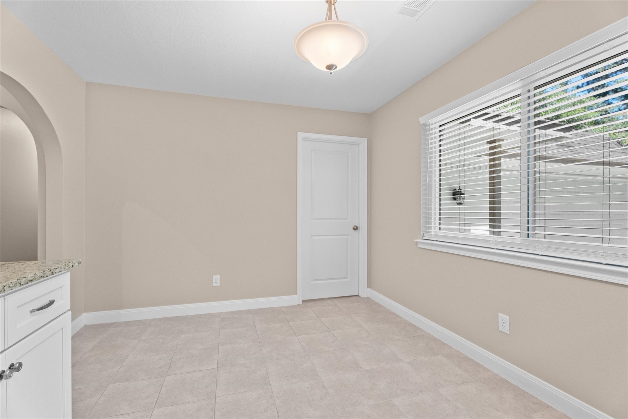 6530 Bayonne Drive Spring, TX 77389 - Photo 18 of 37 a view of a livingroom with an empty space and a window