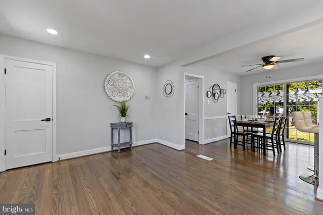 a view of a work space with furniture window and wooden floor