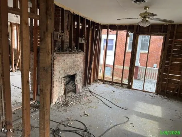 a view of an entryway with a front door