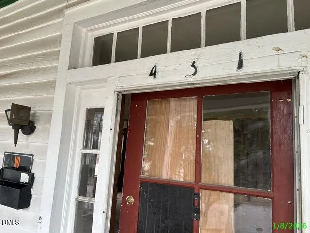 a bathroom with a double vanity sink and mirror
