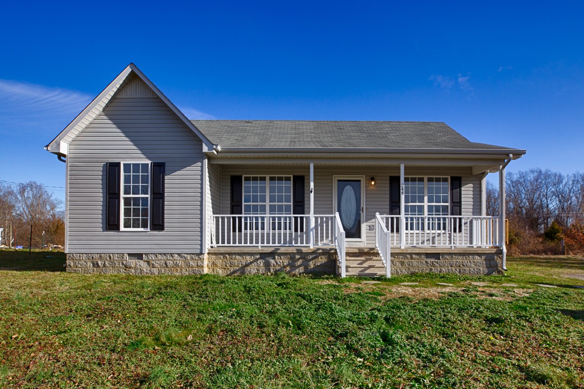 244 East Prospect Road Fayetteville, TN 37334 - Photo 1 of 24 front view of a house with a yard