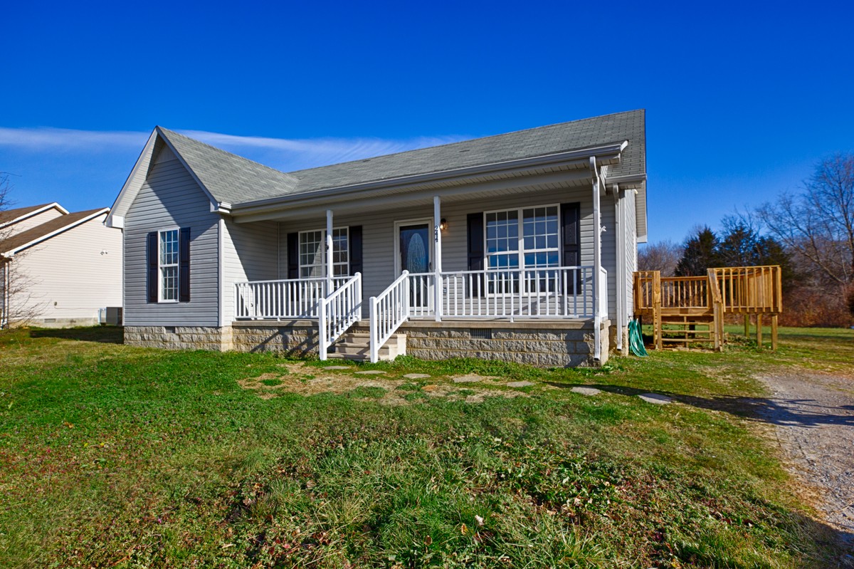 244 East Prospect Road Fayetteville, TN 37334 - Photo 2 of 24 a front view of a house with a yard