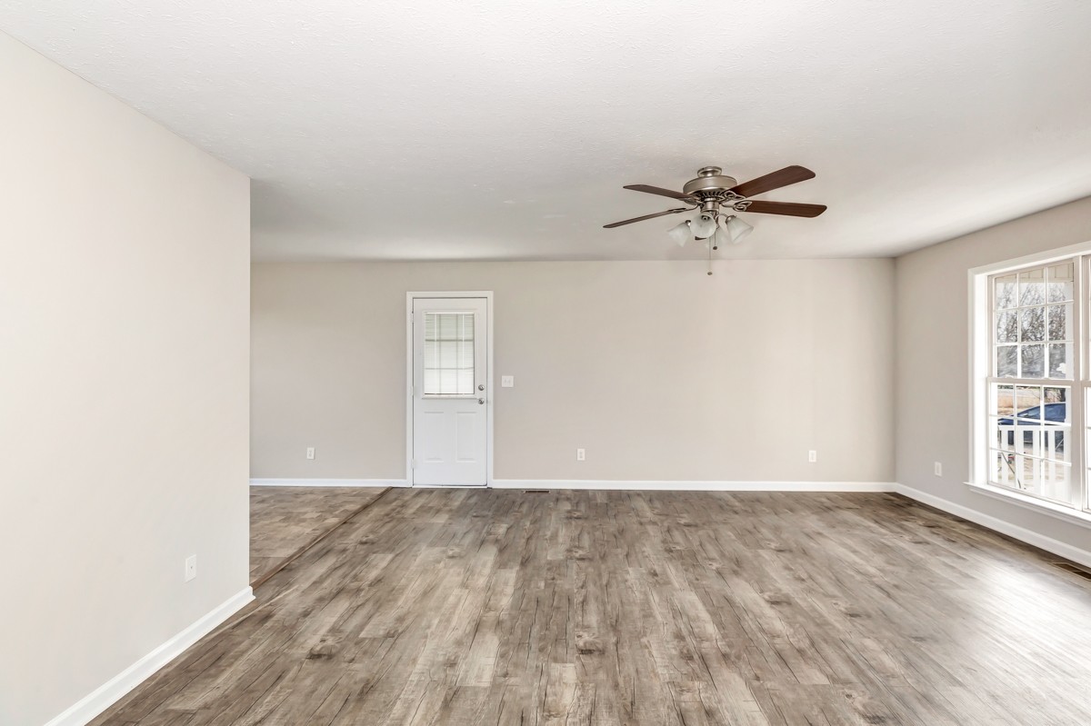244 East Prospect Road Fayetteville, TN 37334 - Photo 11 of 24 a view of a room with wooden floor and windows