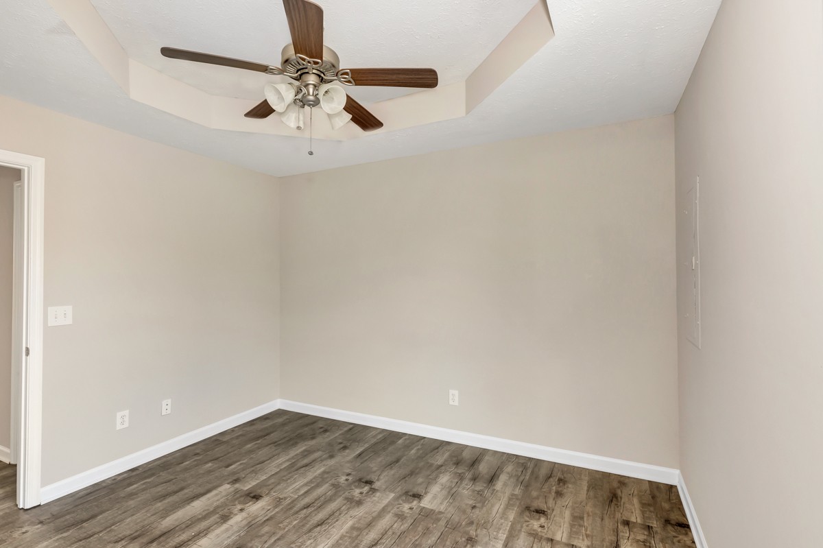 244 East Prospect Road Fayetteville, TN 37334 - Photo 12 of 24 a view of an empty room with wooden floor