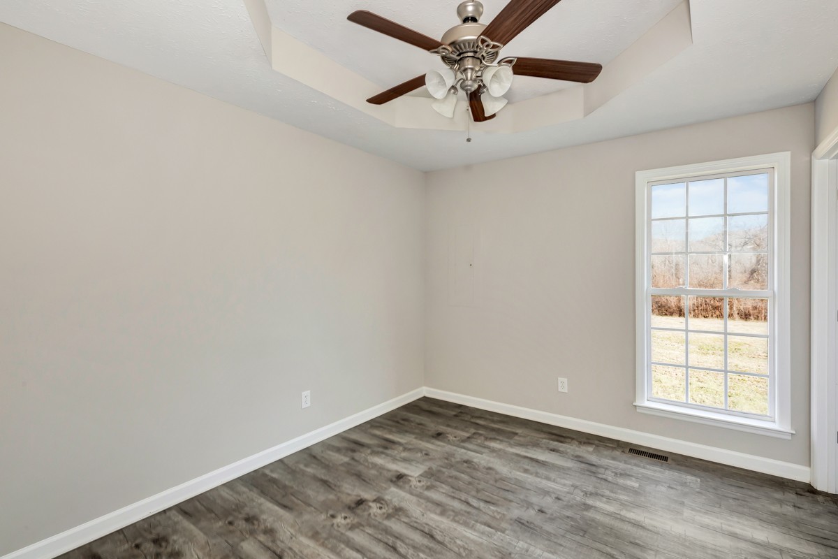 244 East Prospect Road Fayetteville, TN 37334 - Photo 13 of 24 an empty room with a window and a fan