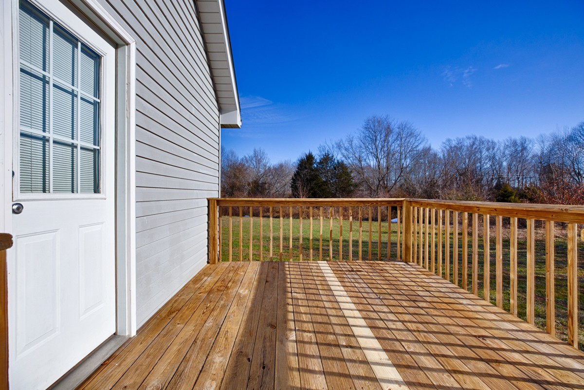 244 East Prospect Road Fayetteville, TN 37334 - Photo 23 of 24 a view of a balcony with wooden floor and fence