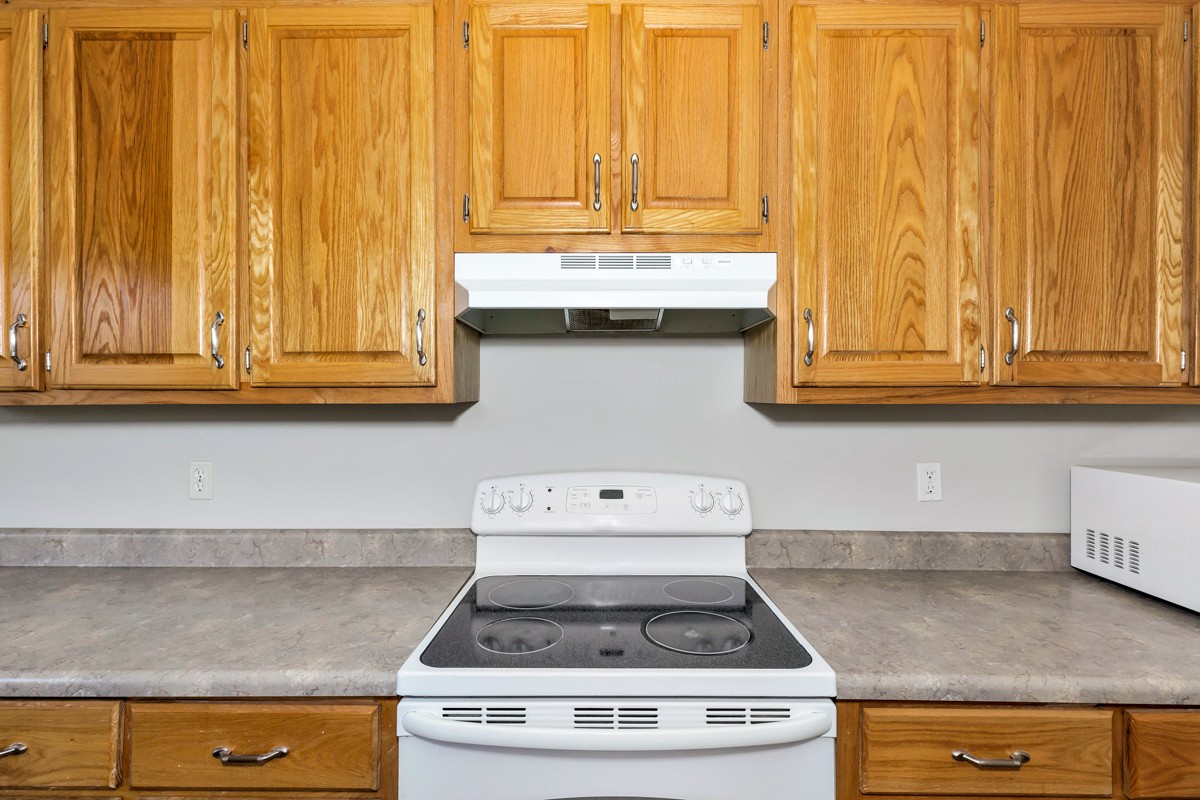 244 East Prospect Road Fayetteville, TN 37334 - Photo 6 of 24 a stove top oven sitting inside of a kitchen